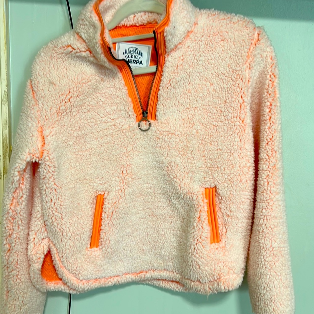 Cuddly Sherpa  orange color size 14/16 with zipper never been used.